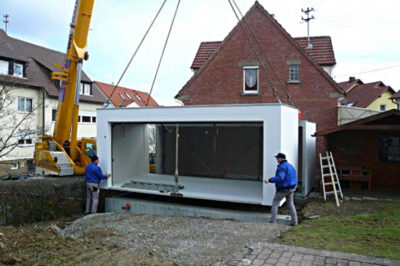 Mise en place d'un garage avec une grue